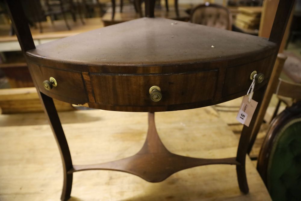 A George III mahogany bow front three tier washstand, width 58cm, depth 40cm, height 108cm